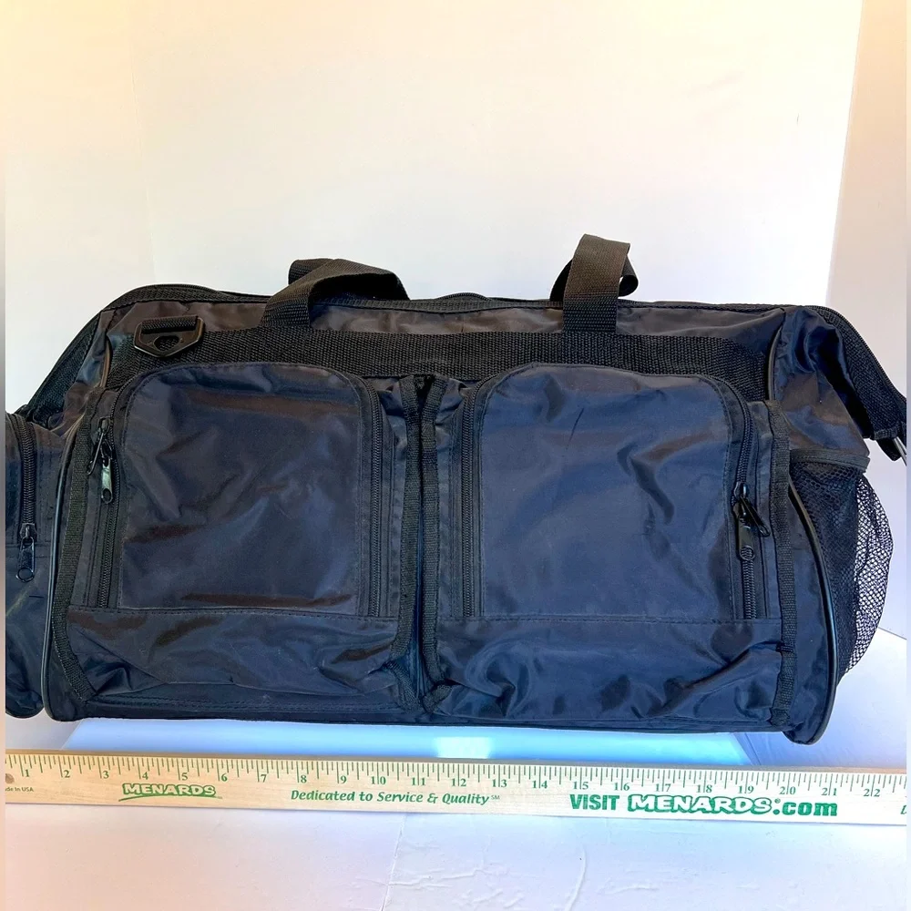 Stylish Vintage Dark Black Duffel Bag with Many Pockets.   New without Tags.